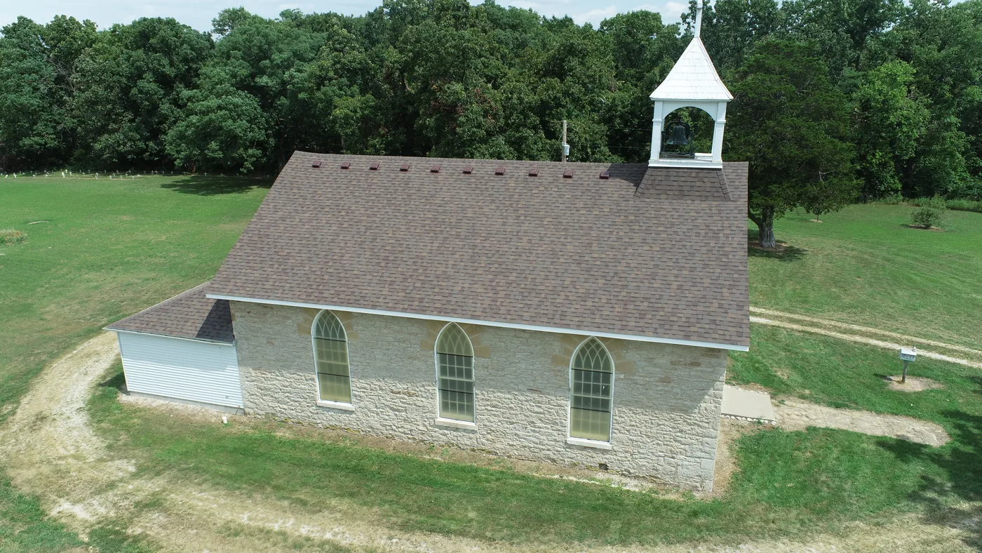 Aerial view of a completed SRA roof on a Springfield-area church