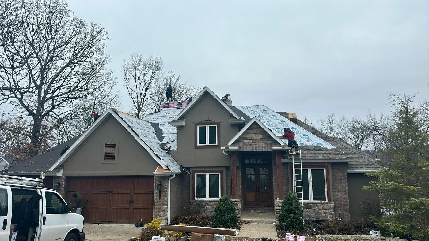 SRA crew installing an asphalt shingle roof on a Springfield home