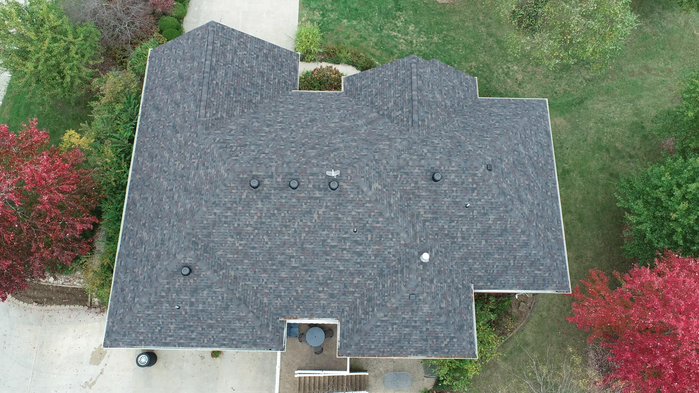Aerial view of a residential roof used for roof measurements